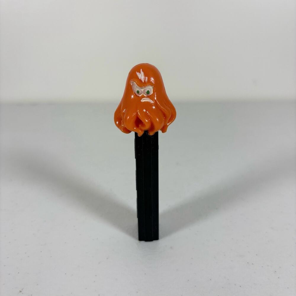 Vintage PEZ Dispenser Orange Angry Octopus Black Stem Austria No Feet Rare